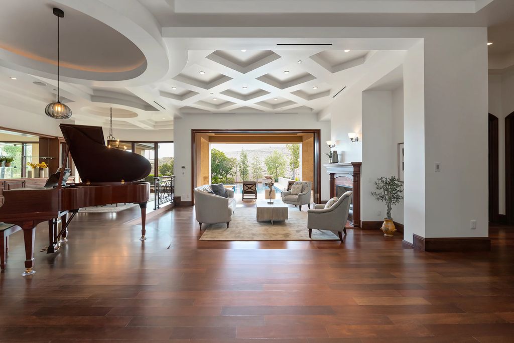 The Home in Las Vegas, an entertainer's dream at the end of a cul-de-sac with unobstructed mountain views boasting large, bright rooms, pocketing doors and windows as well as an abundance of natural light is now available for sale. This home located at 15 Bright Hollow Ct, Las Vegas, Nevada