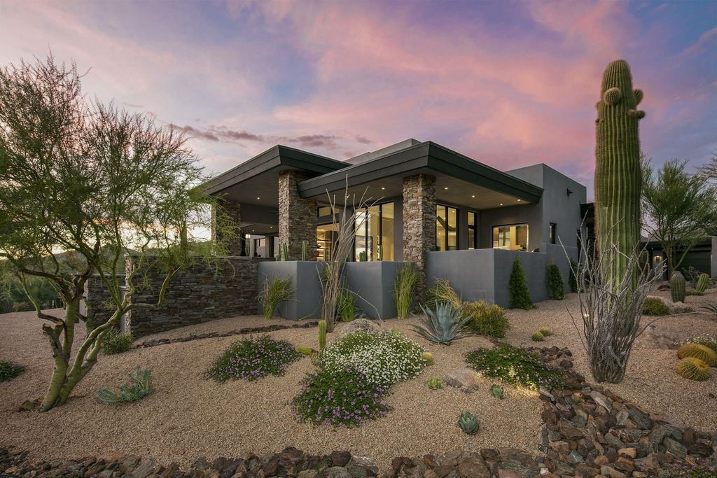 The Home in Scottsdale, a stunning desert contemporary estate which all on one level with open, airy and inviting floor plan encourages the seamless indoor outdoor living experience that is so unique to Arizona  is now available for sale. This home located at 39813 N 103rd Way, Scottsdale, Arizona