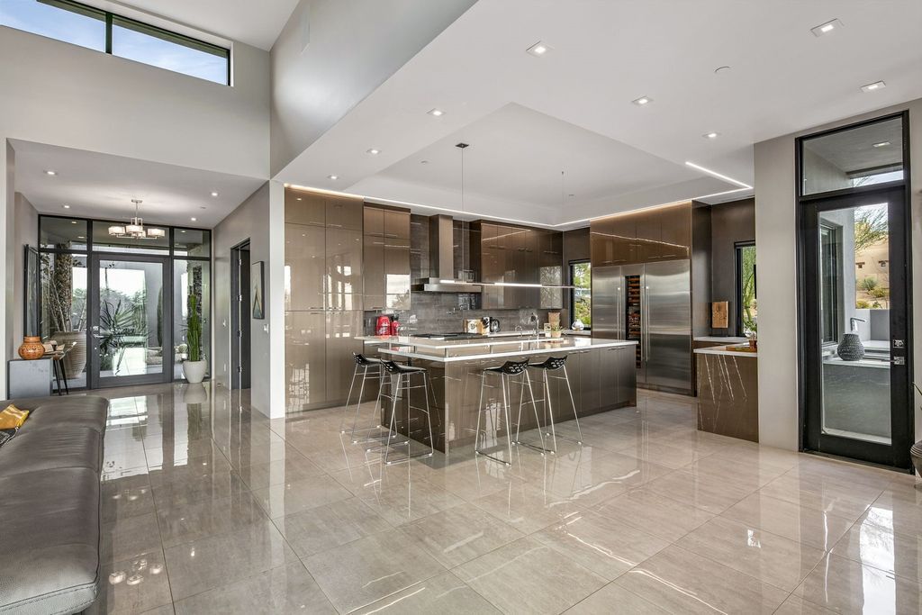 The Home in Scottsdale, a stunning desert contemporary estate which all on one level with open, airy and inviting floor plan encourages the seamless indoor outdoor living experience that is so unique to Arizona  is now available for sale. This home located at 39813 N 103rd Way, Scottsdale, Arizona
