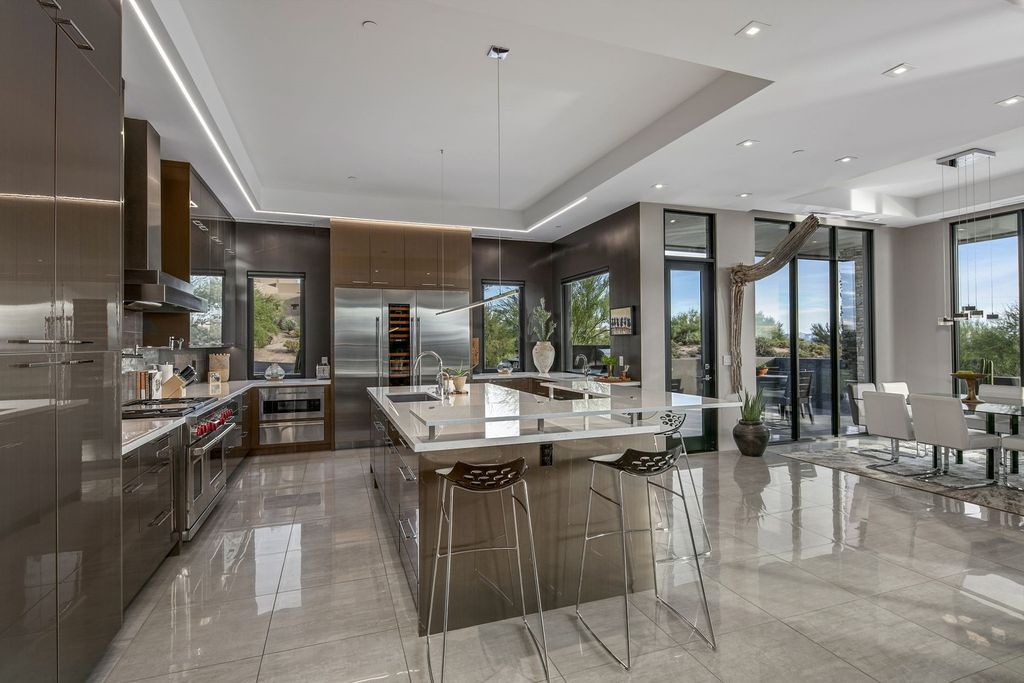 The Home in Scottsdale, a stunning desert contemporary estate which all on one level with open, airy and inviting floor plan encourages the seamless indoor outdoor living experience that is so unique to Arizona  is now available for sale. This home located at 39813 N 103rd Way, Scottsdale, Arizona