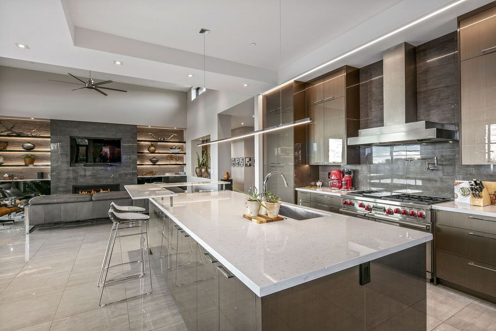 The Home in Scottsdale, a stunning desert contemporary estate which all on one level with open, airy and inviting floor plan encourages the seamless indoor outdoor living experience that is so unique to Arizona  is now available for sale. This home located at 39813 N 103rd Way, Scottsdale, Arizona