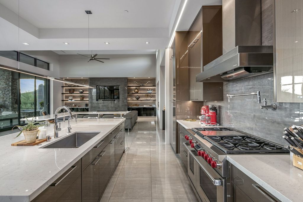 The Home in Scottsdale, a stunning desert contemporary estate which all on one level with open, airy and inviting floor plan encourages the seamless indoor outdoor living experience that is so unique to Arizona  is now available for sale. This home located at 39813 N 103rd Way, Scottsdale, Arizona