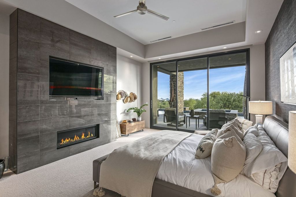 The Home in Scottsdale, a stunning desert contemporary estate which all on one level with open, airy and inviting floor plan encourages the seamless indoor outdoor living experience that is so unique to Arizona  is now available for sale. This home located at 39813 N 103rd Way, Scottsdale, Arizona