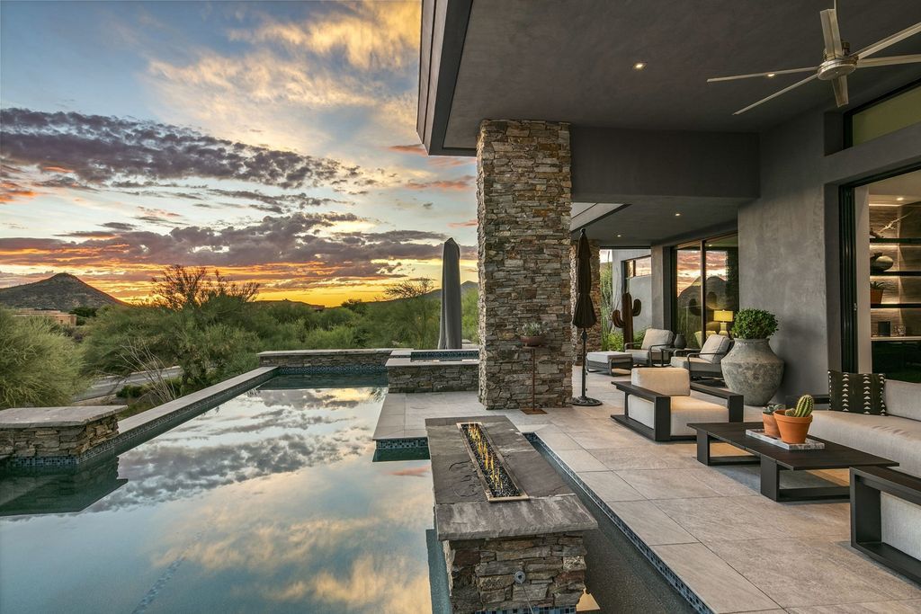 The Home in Scottsdale, a stunning desert contemporary estate which all on one level with open, airy and inviting floor plan encourages the seamless indoor outdoor living experience that is so unique to Arizona  is now available for sale. This home located at 39813 N 103rd Way, Scottsdale, Arizona