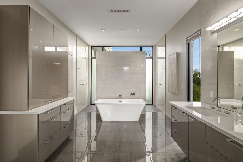 The Home in Scottsdale, a stunning desert contemporary estate which all on one level with open, airy and inviting floor plan encourages the seamless indoor outdoor living experience that is so unique to Arizona  is now available for sale. This home located at 39813 N 103rd Way, Scottsdale, Arizona
