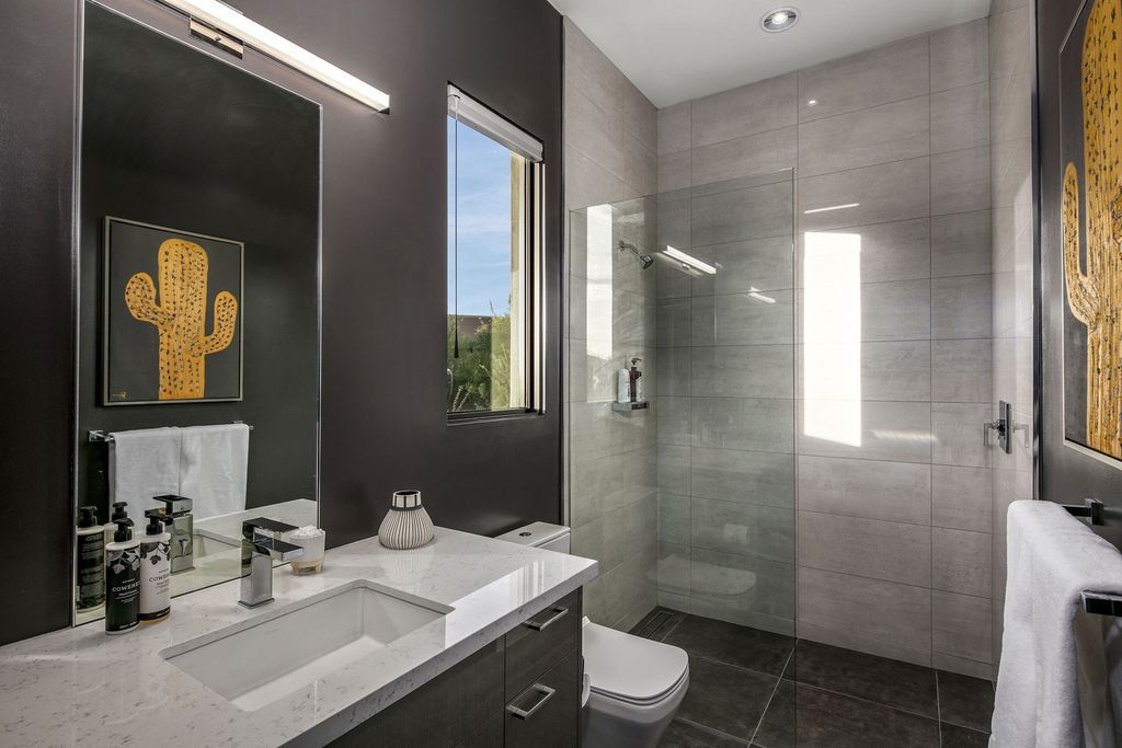 The Home in Scottsdale, a stunning desert contemporary estate which all on one level with open, airy and inviting floor plan encourages the seamless indoor outdoor living experience that is so unique to Arizona  is now available for sale. This home located at 39813 N 103rd Way, Scottsdale, Arizona