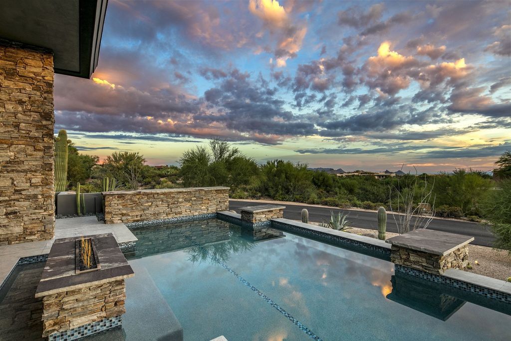 The Home in Scottsdale, a stunning desert contemporary estate which all on one level with open, airy and inviting floor plan encourages the seamless indoor outdoor living experience that is so unique to Arizona  is now available for sale. This home located at 39813 N 103rd Way, Scottsdale, Arizona