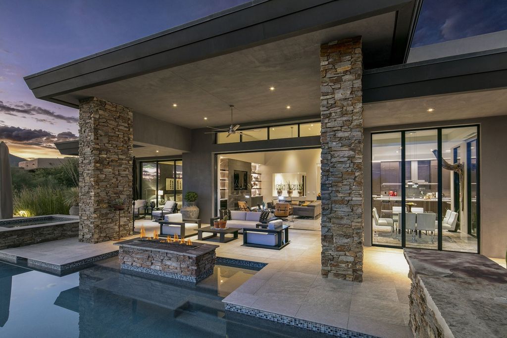 The Home in Scottsdale, a stunning desert contemporary estate which all on one level with open, airy and inviting floor plan encourages the seamless indoor outdoor living experience that is so unique to Arizona  is now available for sale. This home located at 39813 N 103rd Way, Scottsdale, Arizona