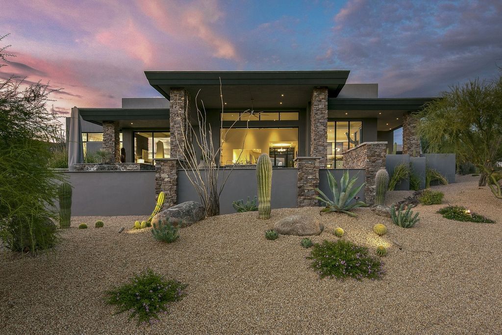 The Home in Scottsdale, a stunning desert contemporary estate which all on one level with open, airy and inviting floor plan encourages the seamless indoor outdoor living experience that is so unique to Arizona  is now available for sale. This home located at 39813 N 103rd Way, Scottsdale, Arizona