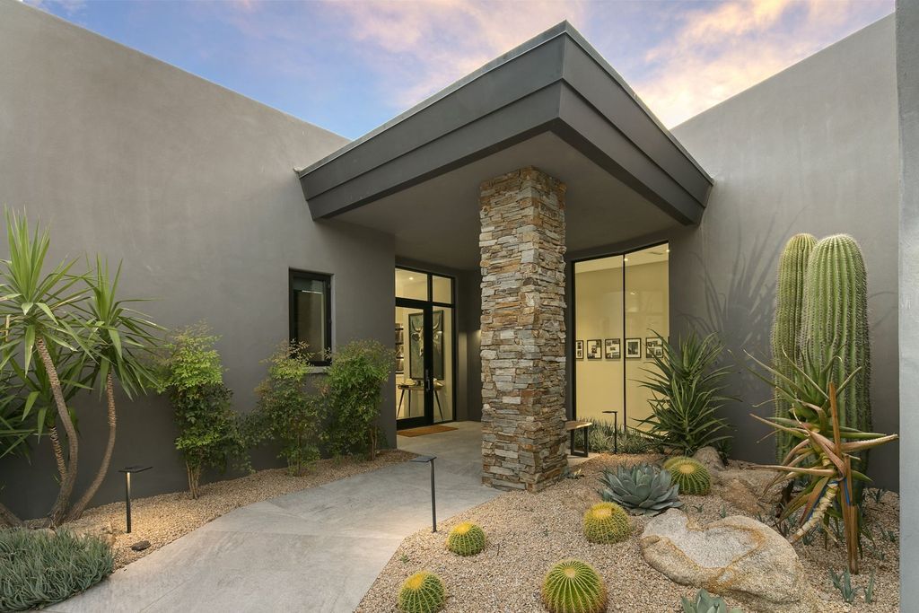 The Home in Scottsdale, a stunning desert contemporary estate which all on one level with open, airy and inviting floor plan encourages the seamless indoor outdoor living experience that is so unique to Arizona  is now available for sale. This home located at 39813 N 103rd Way, Scottsdale, Arizona