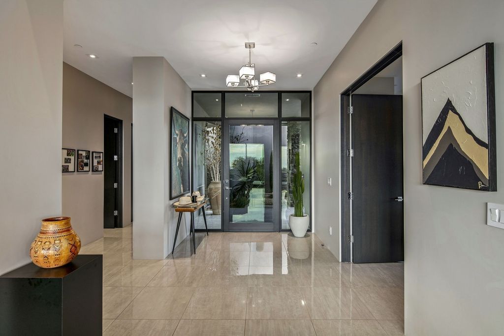 The Home in Scottsdale, a stunning desert contemporary estate which all on one level with open, airy and inviting floor plan encourages the seamless indoor outdoor living experience that is so unique to Arizona  is now available for sale. This home located at 39813 N 103rd Way, Scottsdale, Arizona