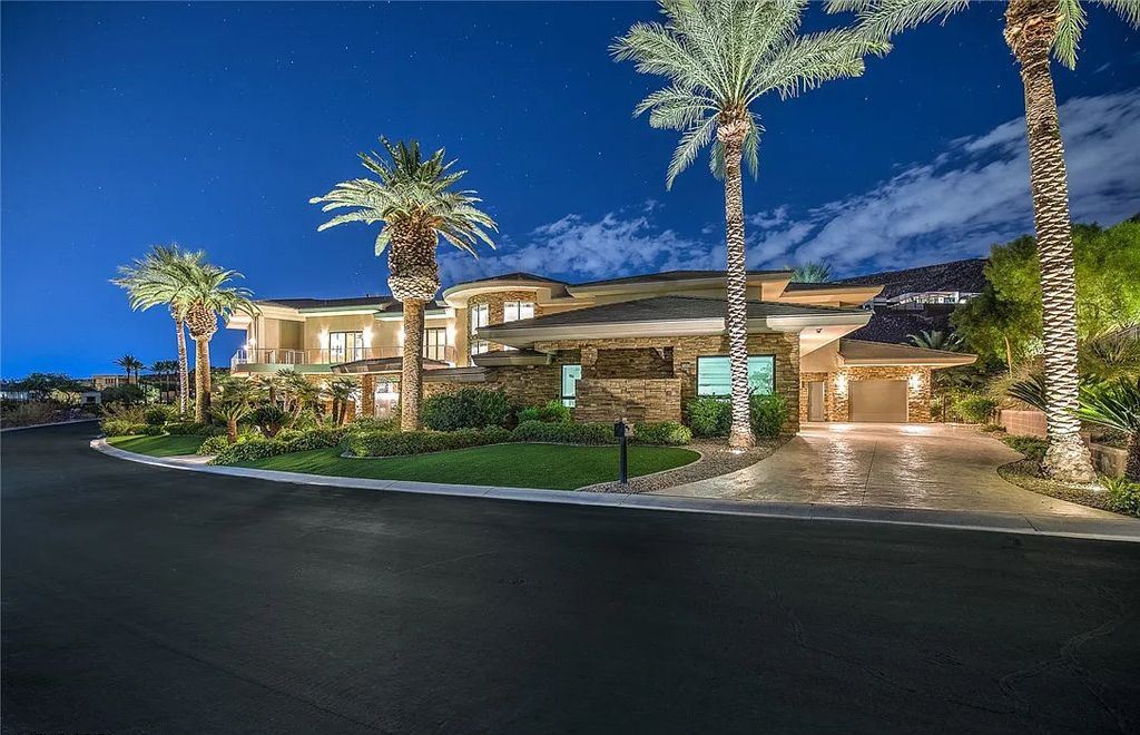 The Home in Henderson, an entirely custom & contemporary home offers views from every room, private courtyard with pool, spa, outdoor kitchen, fire pit and built-in BBQ, dual living rooms with fireplaces, motorized shades is now available for sale. This home located at 580 Saint Croix St, Henderson, Nevada