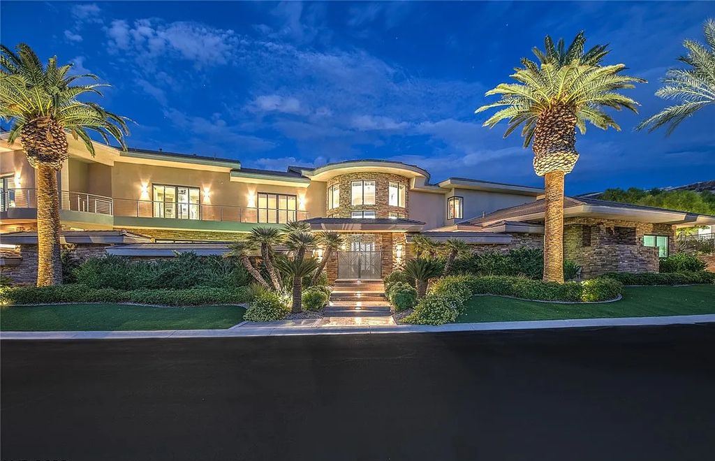 The Home in Henderson, an entirely custom & contemporary home offers views from every room, private courtyard with pool, spa, outdoor kitchen, fire pit and built-in BBQ, dual living rooms with fireplaces, motorized shades is now available for sale. This home located at 580 Saint Croix St, Henderson, Nevada