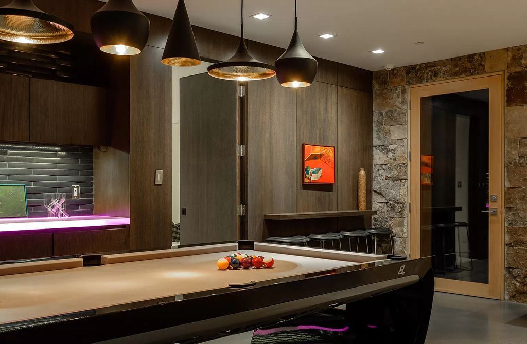 The Estate in Park City is a luxurious home full of handcrafted details, contemporary finishes, top-of-the-line appliances, and the latest in smart home systems now available for sale. This home located at 915 Mellow Mtn, Park City, Utah; offering 05 bedrooms and 07 bathrooms with 6,632 square feet of living spaces.