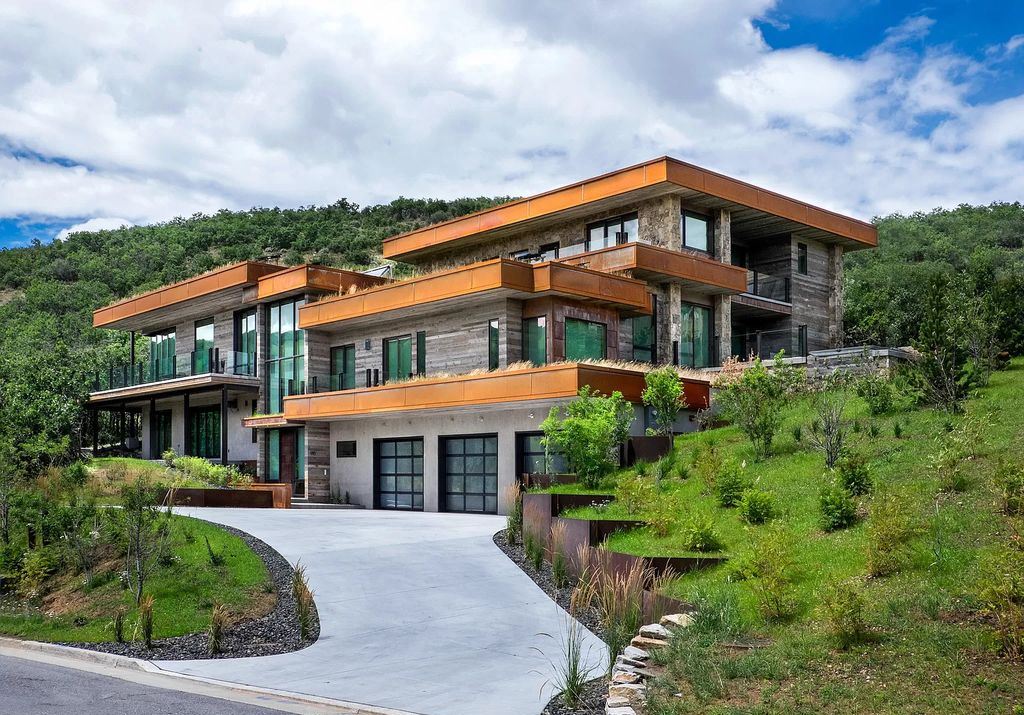 The Estate in Park City is a luxurious home full of handcrafted details, contemporary finishes, top-of-the-line appliances, and the latest in smart home systems now available for sale. This home located at 915 Mellow Mtn, Park City, Utah; offering 05 bedrooms and 07 bathrooms with 6,632 square feet of living spaces.