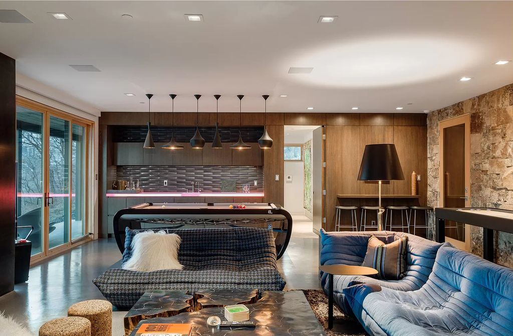 The Estate in Park City is a luxurious home full of handcrafted details, contemporary finishes, top-of-the-line appliances, and the latest in smart home systems now available for sale. This home located at 915 Mellow Mtn, Park City, Utah; offering 05 bedrooms and 07 bathrooms with 6,632 square feet of living spaces.