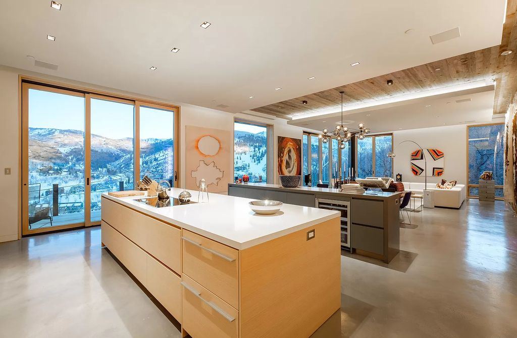 The Estate in Park City is a luxurious home full of handcrafted details, contemporary finishes, top-of-the-line appliances, and the latest in smart home systems now available for sale. This home located at 915 Mellow Mtn, Park City, Utah; offering 05 bedrooms and 07 bathrooms with 6,632 square feet of living spaces.
