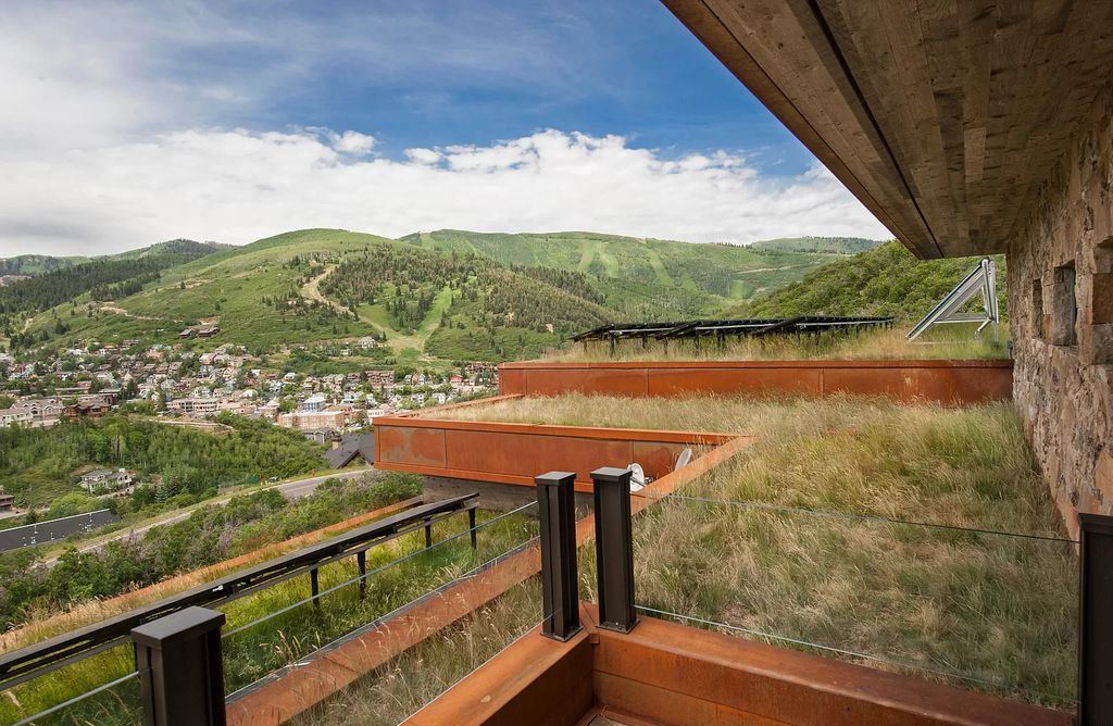 The Estate in Park City is a luxurious home full of handcrafted details, contemporary finishes, top-of-the-line appliances, and the latest in smart home systems now available for sale. This home located at 915 Mellow Mtn, Park City, Utah; offering 05 bedrooms and 07 bathrooms with 6,632 square feet of living spaces.