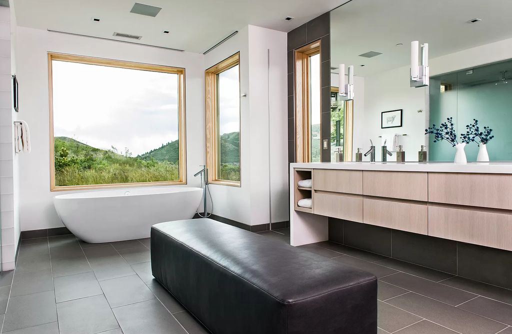 The Estate in Park City is a luxurious home full of handcrafted details, contemporary finishes, top-of-the-line appliances, and the latest in smart home systems now available for sale. This home located at 915 Mellow Mtn, Park City, Utah; offering 05 bedrooms and 07 bathrooms with 6,632 square feet of living spaces.