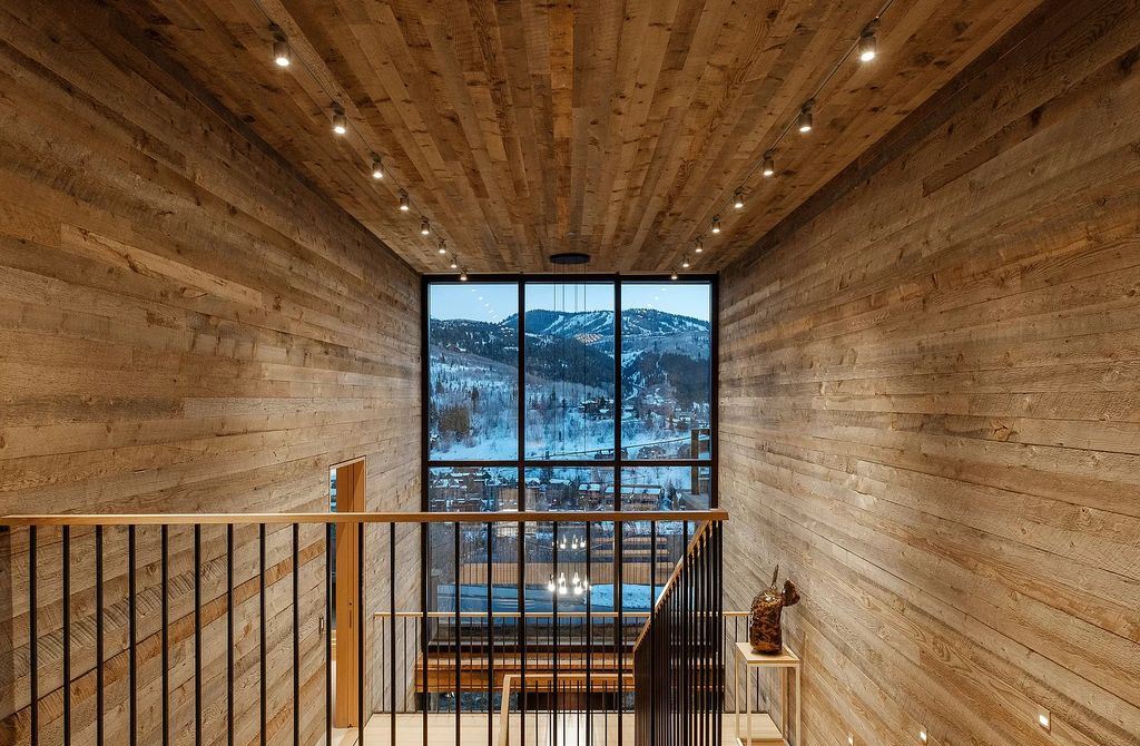 The Estate in Park City is a luxurious home full of handcrafted details, contemporary finishes, top-of-the-line appliances, and the latest in smart home systems now available for sale. This home located at 915 Mellow Mtn, Park City, Utah; offering 05 bedrooms and 07 bathrooms with 6,632 square feet of living spaces.