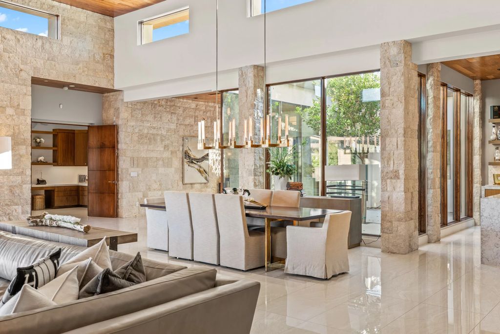 The Home in Las Vegas, an exceptional property boasts the pinnacle of luxury living with amazing entertaining features including resort-style backyard, pool & spa, elevator, kitchen pavilion, fire table, & an expansive turf area and more is now available for sale. This home located at 16 Flying Cloud Ln, Las Vegas, Nevada