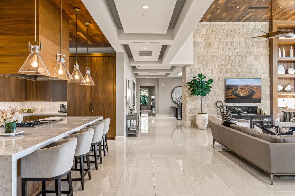 The Home in Las Vegas, an exceptional property boasts the pinnacle of luxury living with amazing entertaining features including resort-style backyard, pool & spa, elevator, kitchen pavilion, fire table, & an expansive turf area and more is now available for sale. This home located at 16 Flying Cloud Ln, Las Vegas, Nevada