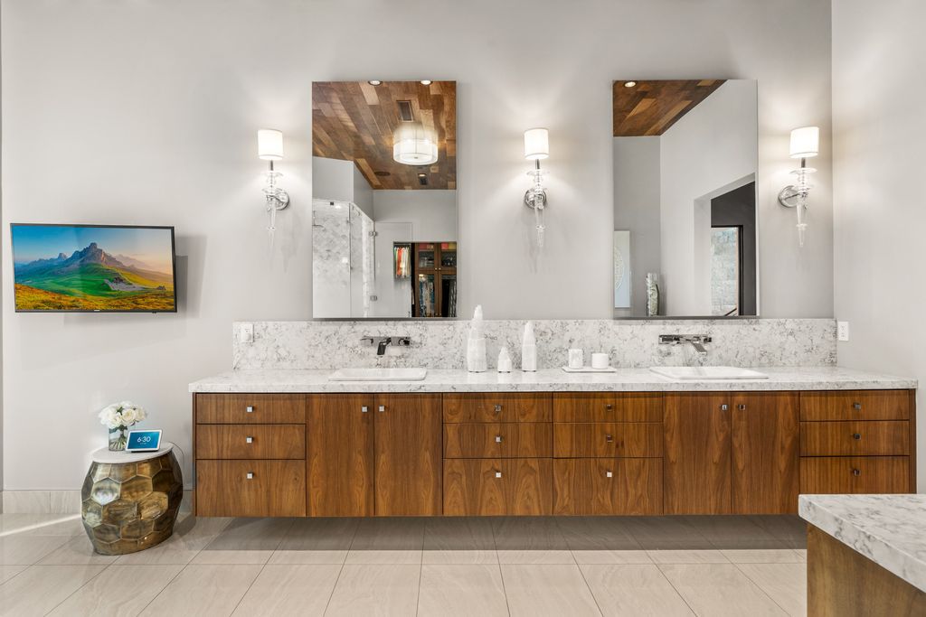 The Home in Las Vegas, an exceptional property boasts the pinnacle of luxury living with amazing entertaining features including resort-style backyard, pool & spa, elevator, kitchen pavilion, fire table, & an expansive turf area and more is now available for sale. This home located at 16 Flying Cloud Ln, Las Vegas, Nevada