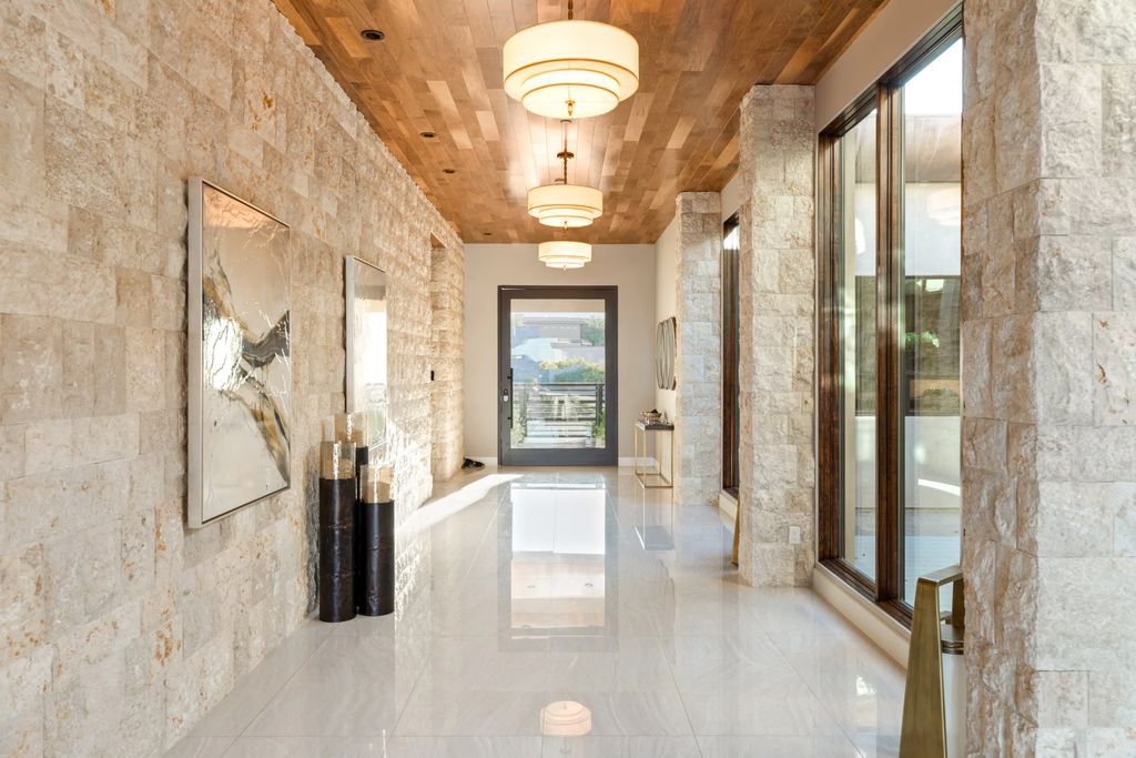 The Home in Las Vegas, an exceptional property boasts the pinnacle of luxury living with amazing entertaining features including resort-style backyard, pool & spa, elevator, kitchen pavilion, fire table, & an expansive turf area and more is now available for sale. This home located at 16 Flying Cloud Ln, Las Vegas, Nevada