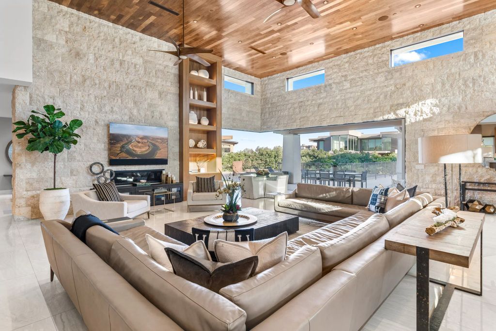 The Home in Las Vegas, an exceptional property boasts the pinnacle of luxury living with amazing entertaining features including resort-style backyard, pool & spa, elevator, kitchen pavilion, fire table, & an expansive turf area and more is now available for sale. This home located at 16 Flying Cloud Ln, Las Vegas, Nevada