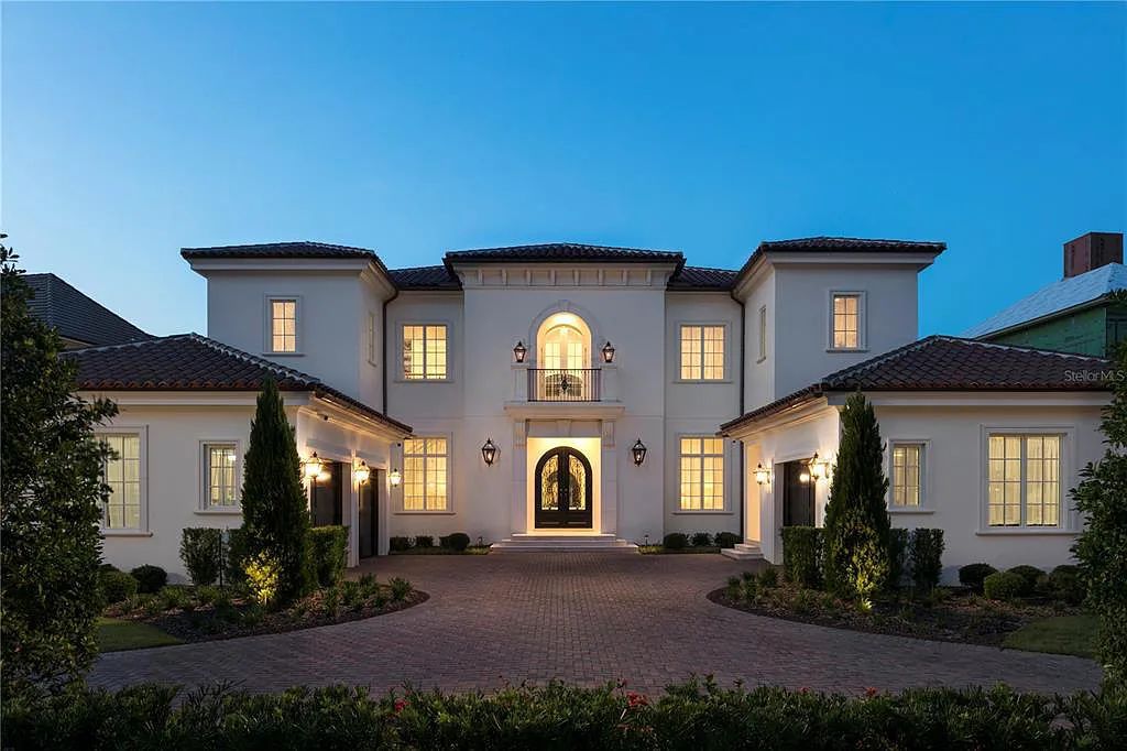The Home in Orlando, a Spanish style residence nestled within the private residential community of Golden Oak with resort features including an expansive chef’s kitchen, Four Seasons catering kitchen, elevator, 3-car garage and two flex rooms is now available for sale. This home located at 10285 Summer Meadow Way, Orlando, Florida
