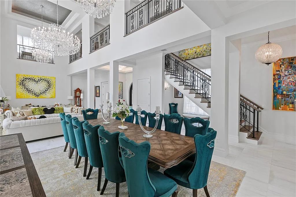 The Home in Orlando, a Spanish style residence nestled within the private residential community of Golden Oak with resort features including an expansive chef’s kitchen, Four Seasons catering kitchen, elevator, 3-car garage and two flex rooms is now available for sale. This home located at 10285 Summer Meadow Way, Orlando, Florida