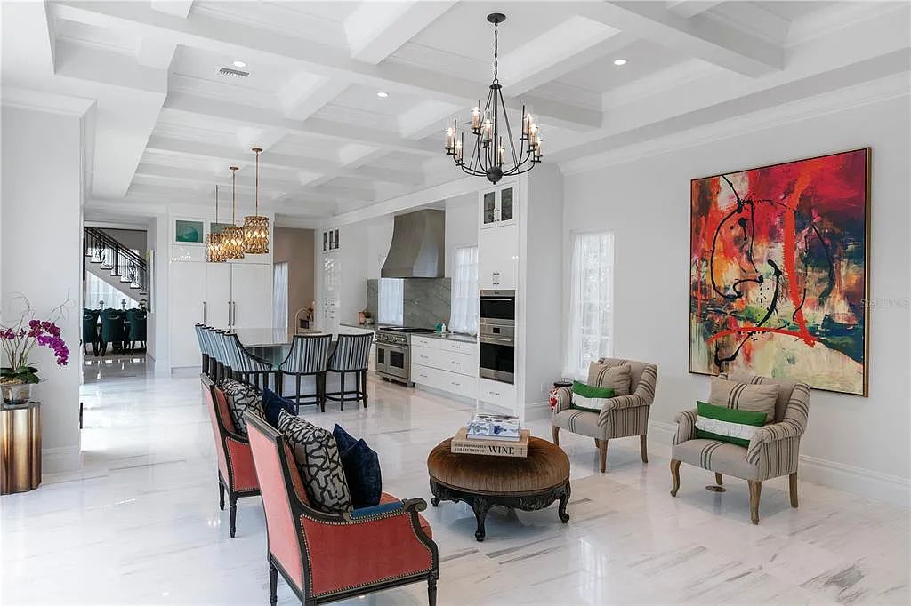 The Home in Orlando, a Spanish style residence nestled within the private residential community of Golden Oak with resort features including an expansive chef’s kitchen, Four Seasons catering kitchen, elevator, 3-car garage and two flex rooms is now available for sale. This home located at 10285 Summer Meadow Way, Orlando, Florida