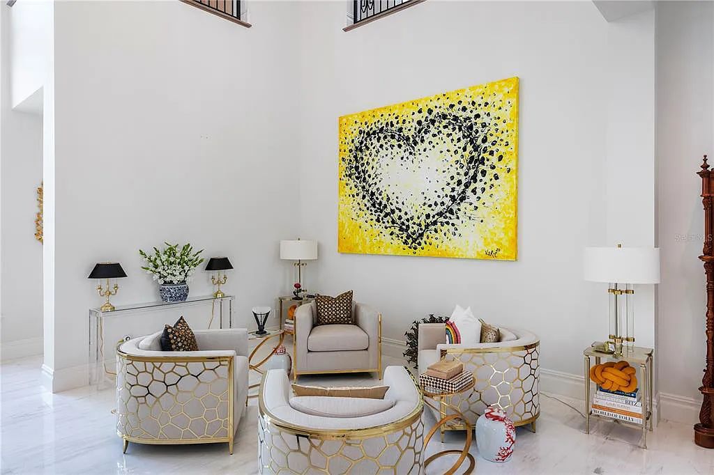 The Home in Orlando, a Spanish style residence nestled within the private residential community of Golden Oak with resort features including an expansive chef’s kitchen, Four Seasons catering kitchen, elevator, 3-car garage and two flex rooms is now available for sale. This home located at 10285 Summer Meadow Way, Orlando, Florida