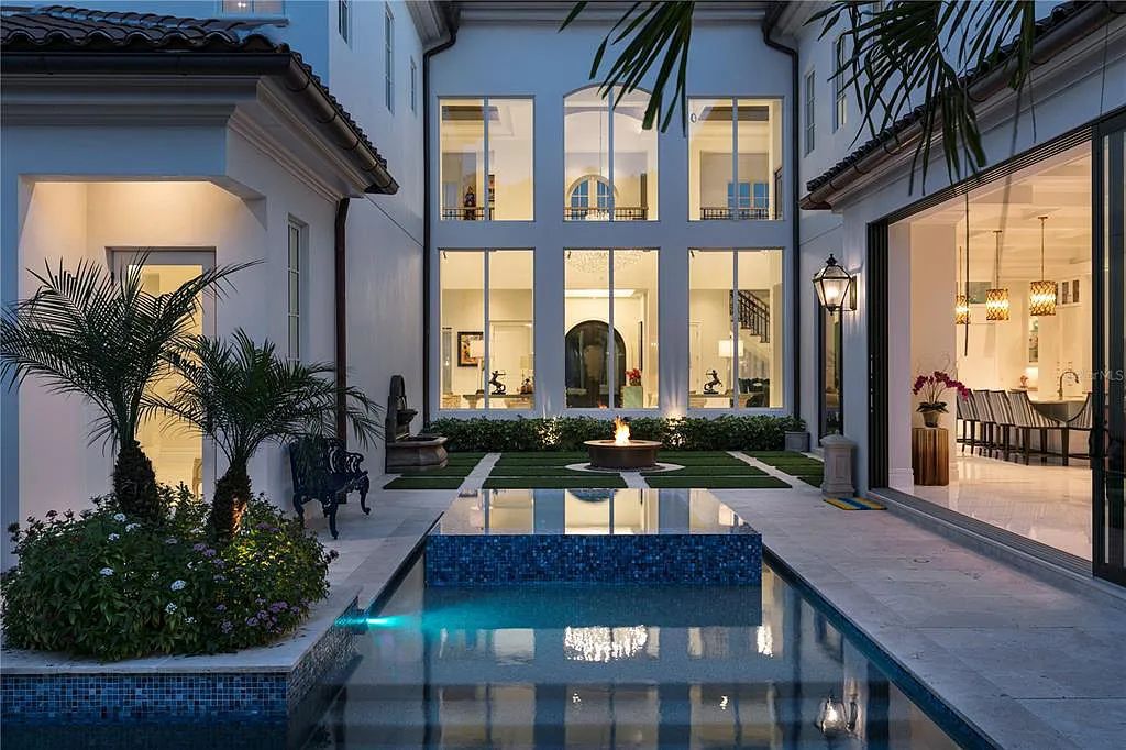 The Home in Orlando, a Spanish style residence nestled within the private residential community of Golden Oak with resort features including an expansive chef’s kitchen, Four Seasons catering kitchen, elevator, 3-car garage and two flex rooms is now available for sale. This home located at 10285 Summer Meadow Way, Orlando, Florida