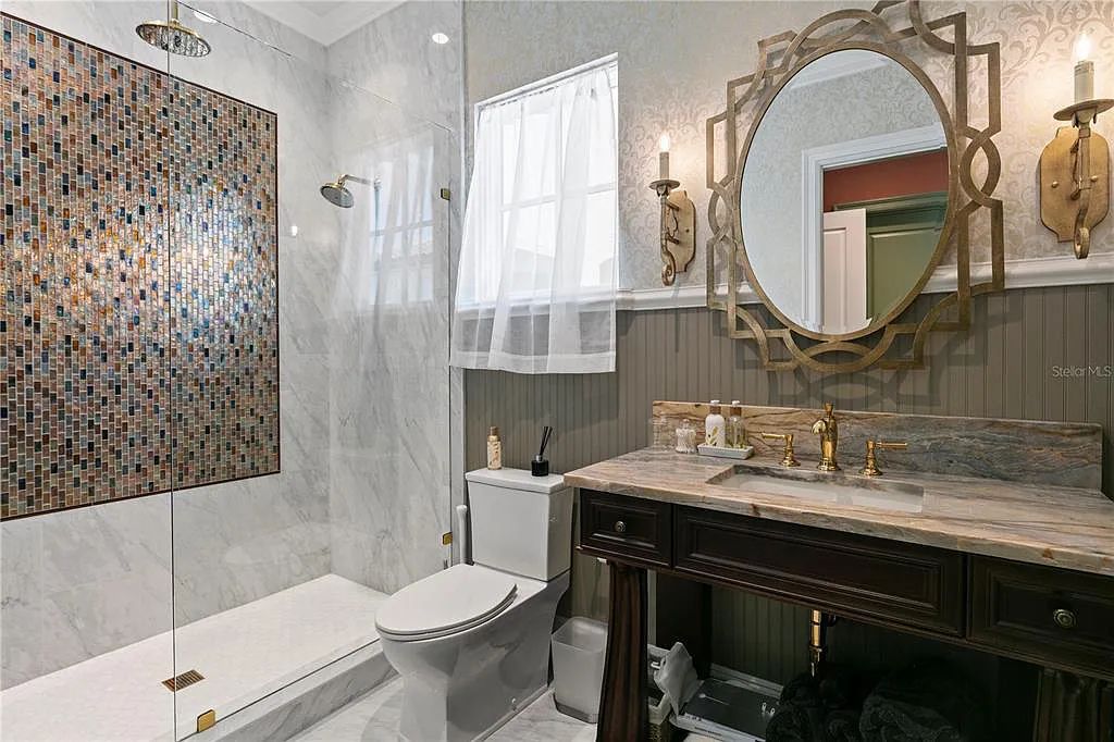 The Home in Orlando, a Spanish style residence nestled within the private residential community of Golden Oak with resort features including an expansive chef’s kitchen, Four Seasons catering kitchen, elevator, 3-car garage and two flex rooms is now available for sale. This home located at 10285 Summer Meadow Way, Orlando, Florida