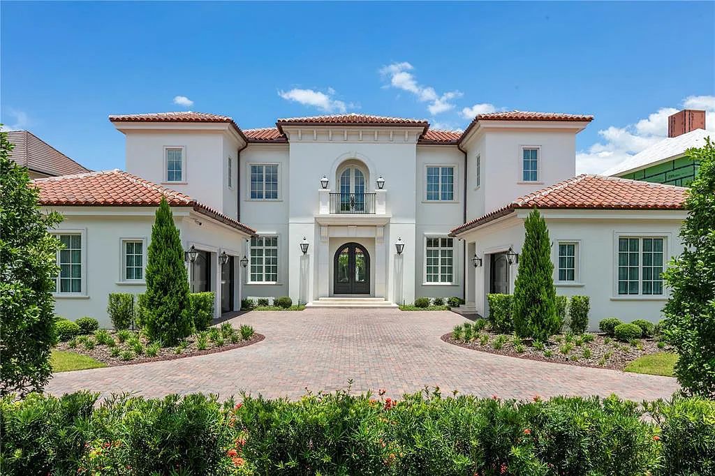 The Home in Orlando, a Spanish style residence nestled within the private residential community of Golden Oak with resort features including an expansive chef’s kitchen, Four Seasons catering kitchen, elevator, 3-car garage and two flex rooms is now available for sale. This home located at 10285 Summer Meadow Way, Orlando, Florida