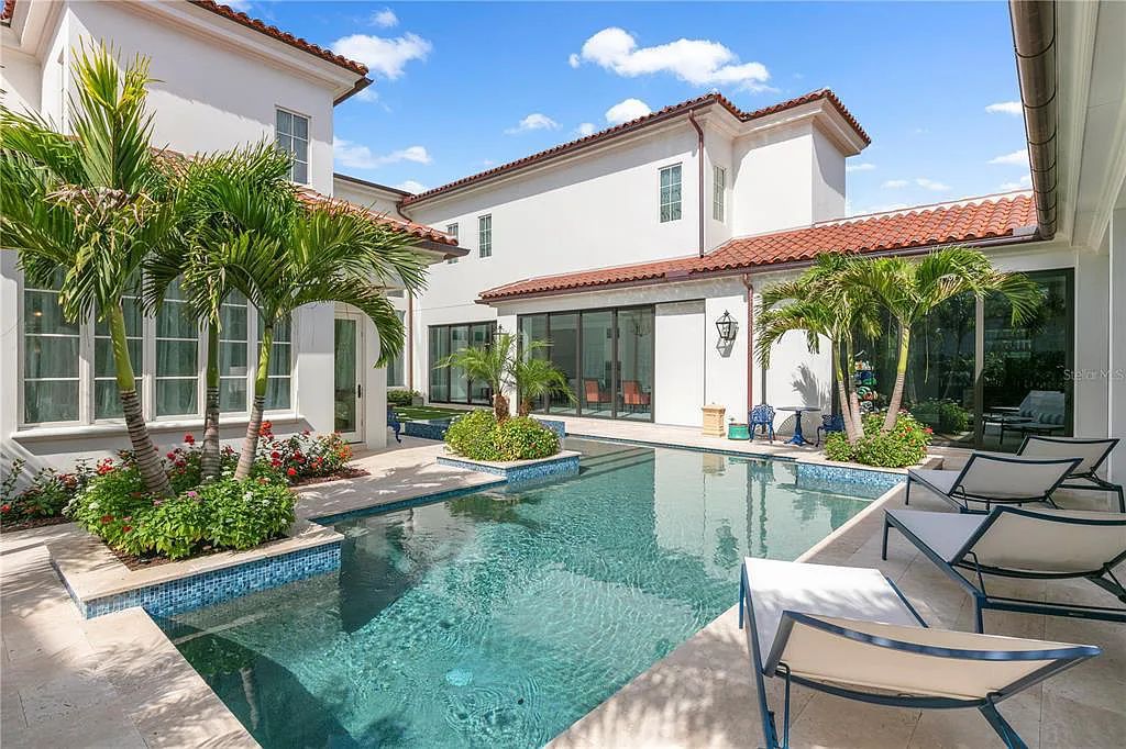 The Home in Orlando, a Spanish style residence nestled within the private residential community of Golden Oak with resort features including an expansive chef’s kitchen, Four Seasons catering kitchen, elevator, 3-car garage and two flex rooms is now available for sale. This home located at 10285 Summer Meadow Way, Orlando, Florida