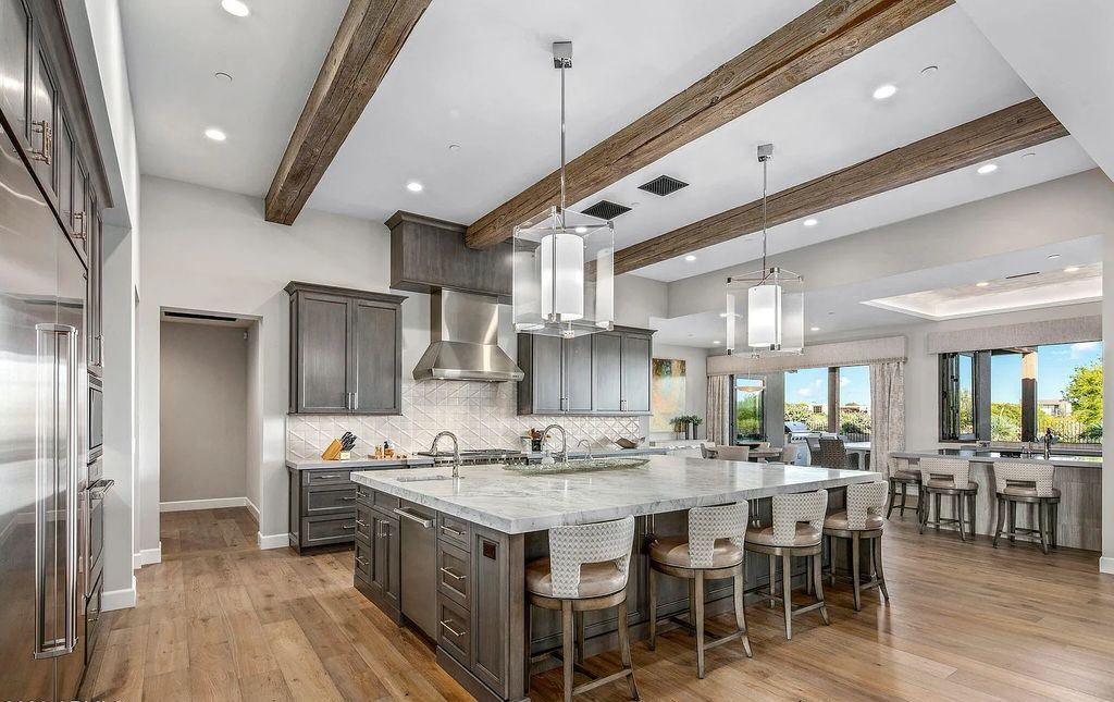 The Home in Scottsdale, a nearly brand new modern farmhouse was upgraded both inside and out set on the beautiful 10th fairway of the award winning Mirabel Club community's Tom Fazio designed golf course is now available for sale. This home located at 36931 N 102nd Pl, Scottsdale, Arizona
