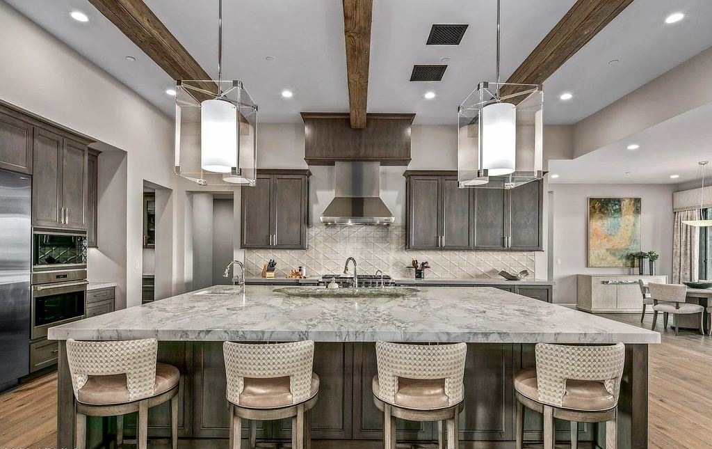 The Home in Scottsdale, a nearly brand new modern farmhouse was upgraded both inside and out set on the beautiful 10th fairway of the award winning Mirabel Club community's Tom Fazio designed golf course is now available for sale. This home located at 36931 N 102nd Pl, Scottsdale, Arizona