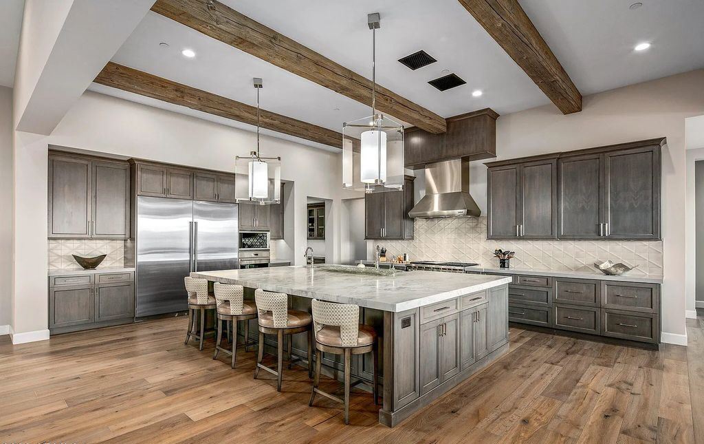 The Home in Scottsdale, a nearly brand new modern farmhouse was upgraded both inside and out set on the beautiful 10th fairway of the award winning Mirabel Club community's Tom Fazio designed golf course is now available for sale. This home located at 36931 N 102nd Pl, Scottsdale, Arizona