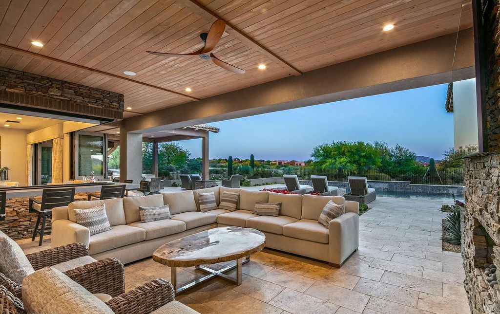 The Home in Scottsdale, a nearly brand new modern farmhouse was upgraded both inside and out set on the beautiful 10th fairway of the award winning Mirabel Club community's Tom Fazio designed golf course is now available for sale. This home located at 36931 N 102nd Pl, Scottsdale, Arizona