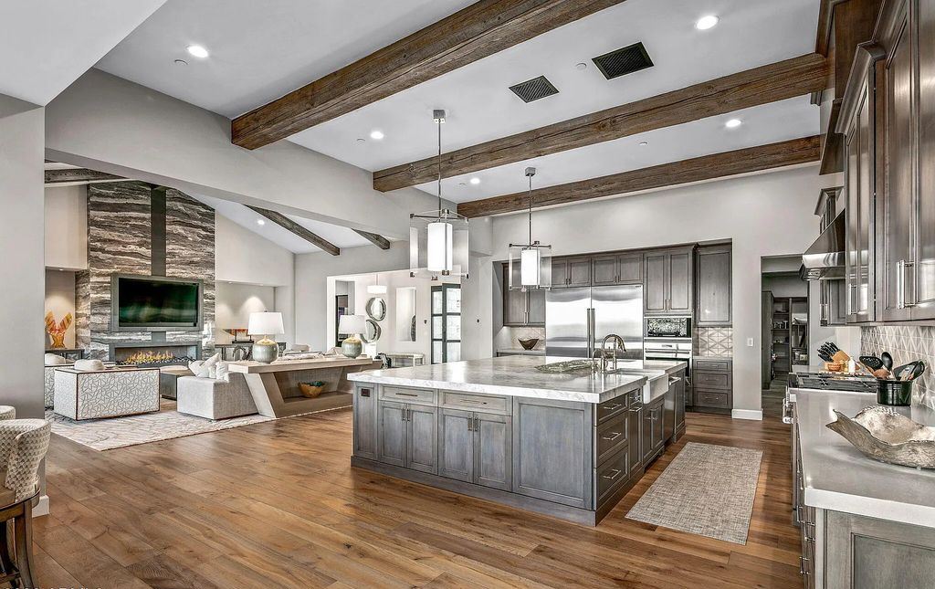 The Home in Scottsdale, a nearly brand new modern farmhouse was upgraded both inside and out set on the beautiful 10th fairway of the award winning Mirabel Club community's Tom Fazio designed golf course is now available for sale. This home located at 36931 N 102nd Pl, Scottsdale, Arizona