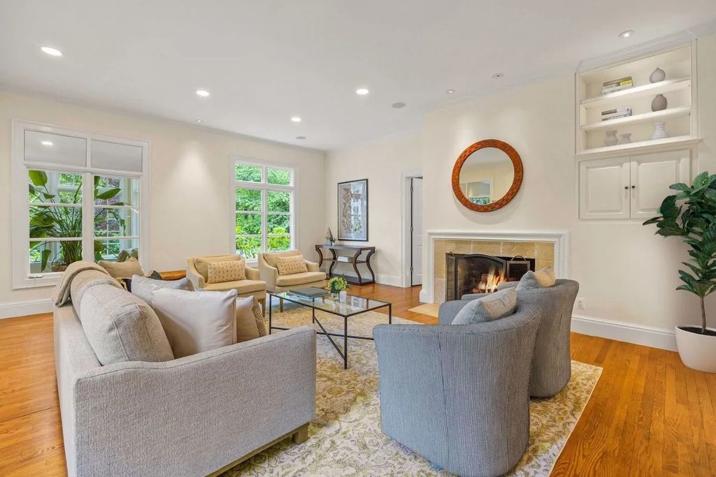 The Home in Bethesda features a private balcony seemingly floating in the woods, while an oversized walk-in closet and spa-inspired bath with separate vanities, now available for sale. This home located at 8814 Chalon Dr, Bethesda, Maryland
