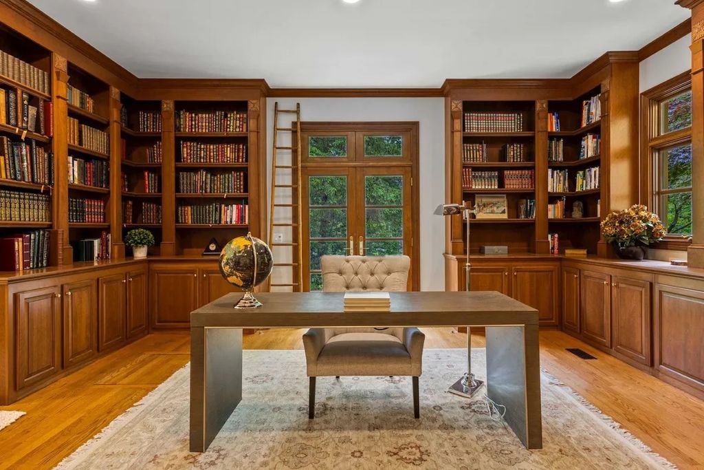 The Home in Bethesda features a private balcony seemingly floating in the woods, while an oversized walk-in closet and spa-inspired bath with separate vanities, now available for sale. This home located at 8814 Chalon Dr, Bethesda, Maryland