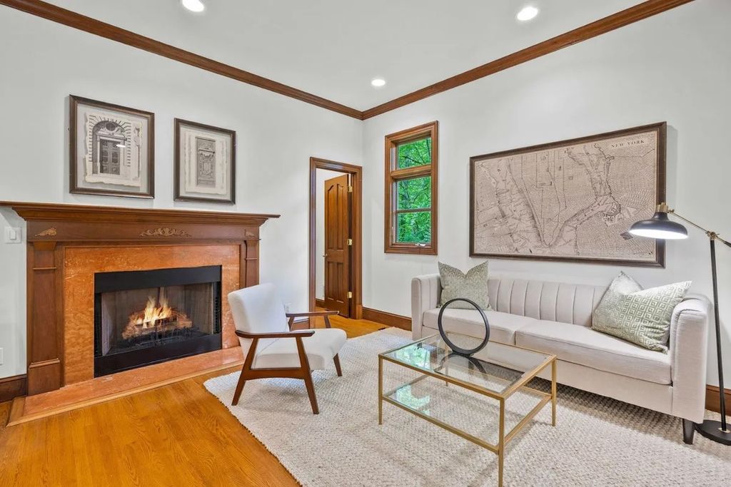 The Home in Bethesda features a private balcony seemingly floating in the woods, while an oversized walk-in closet and spa-inspired bath with separate vanities, now available for sale. This home located at 8814 Chalon Dr, Bethesda, Maryland