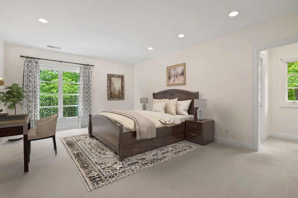 The Home in Bethesda features a private balcony seemingly floating in the woods, while an oversized walk-in closet and spa-inspired bath with separate vanities, now available for sale. This home located at 8814 Chalon Dr, Bethesda, Maryland