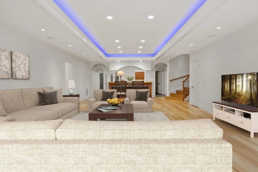 The Home in Bethesda features a private balcony seemingly floating in the woods, while an oversized walk-in closet and spa-inspired bath with separate vanities, now available for sale. This home located at 8814 Chalon Dr, Bethesda, Maryland