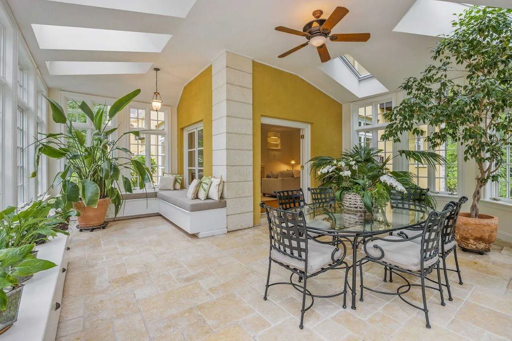 The Home in Bethesda features a private balcony seemingly floating in the woods, while an oversized walk-in closet and spa-inspired bath with separate vanities, now available for sale. This home located at 8814 Chalon Dr, Bethesda, Maryland