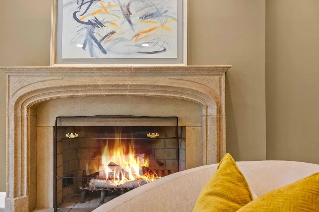 The Home in Bethesda features a private balcony seemingly floating in the woods, while an oversized walk-in closet and spa-inspired bath with separate vanities, now available for sale. This home located at 8814 Chalon Dr, Bethesda, Maryland