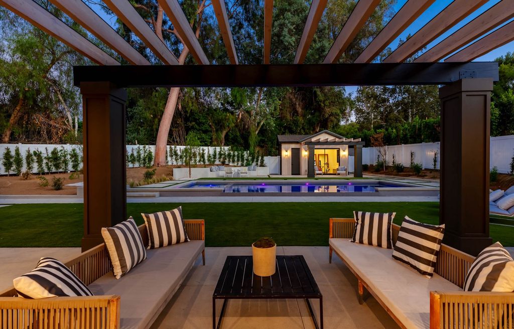 The Home in Tarzana, a secluded residence has been meticulously crafted with luxury comfort in mind offering an exquisite living experience is now available for sale. This home located at 5124 Calvin Ave, Tarzana, California